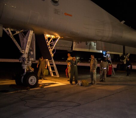 Aircrew depart a B-1 Lancer after returning from a sortie during a Joint Interagency Task Force South mission out of the Boca Chica Naval Air Station, Key West Fla., March 22, 2017. Aircrew from the 489th Bombardment Group and the 7th Bomb Wing flew more than 70 hours and searched more than 3.2 million square miles of ocean leading to the confiscation of more than 4,500 kilos of illicit drugs. (U.S. Air Force photo by Staff Sgt. Jason McCasland/released)