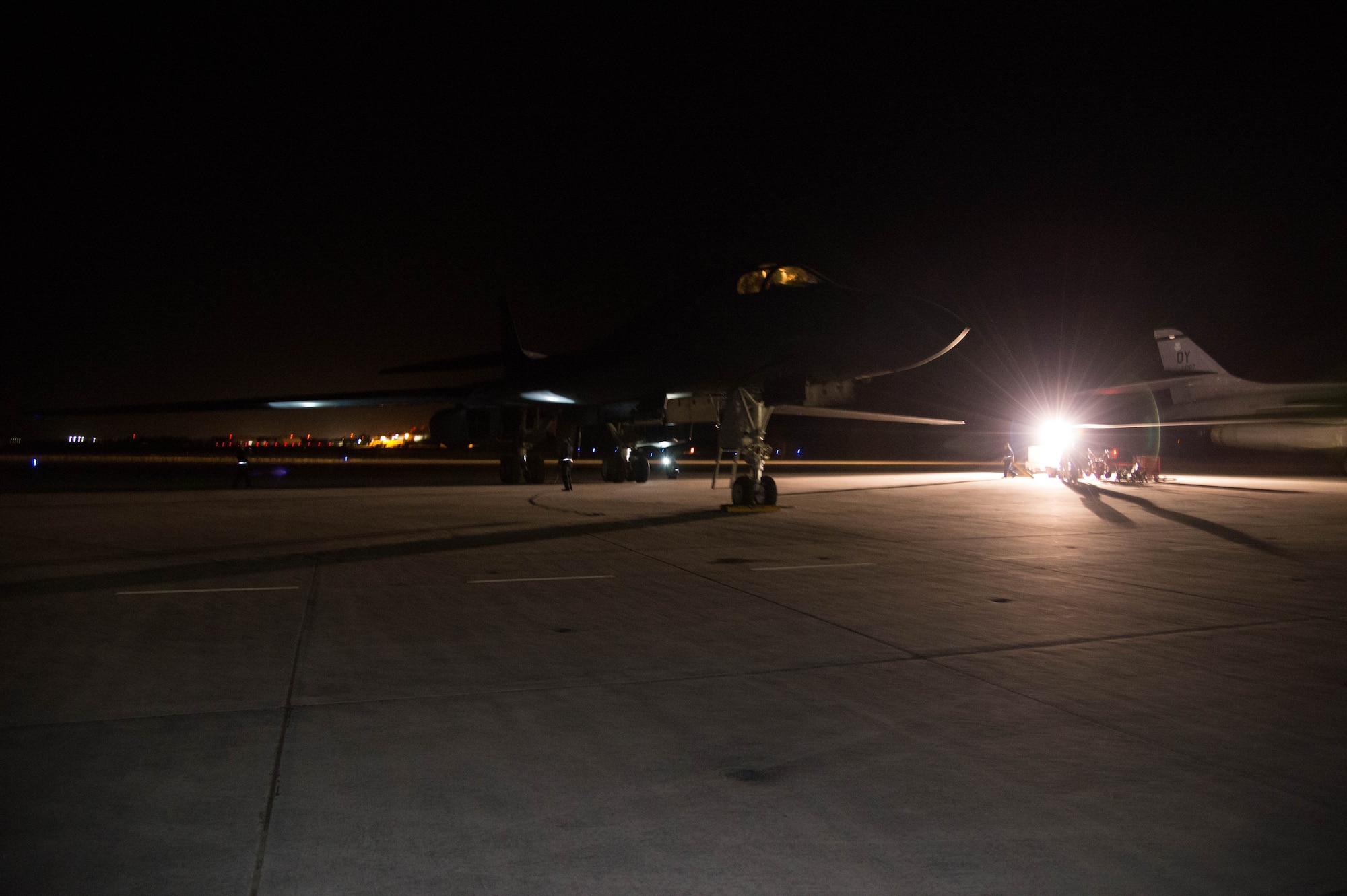 A B-1 Lancer sits on the flightline at the Boca Chica Naval Air Station, Key West Fla., March 23, 2017. Airmen from the 489th Bombardment Group and the 7th Bomb Wing are part of Total Force Integration; working together to complete the bomber mission. (U.S. Air Force photo by Staff Sgt. Jason McCasland/released)