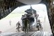 Members of the 21st Airlift Squadron work with members of the United States Army Air Ambulance Detachment, part of the 16th Combat Aviation Brigade, load a UH-60 Black Hawk helicopter onto a C-17 Globemaster III April 7 at Yakima Training Center, Washington. The joint training mission focused on the two units teaching and learning from one another about helicopter loading techniques. (U.S. Air Force photo / 2nd. Lt. Sarah Johnson)