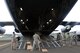 Members of the United States Army Air Ambulance Detachment, part of the 16th Combat Aviation Brigade, load a UH-60 Black Hawk helicopter onto a C-17 Globemaster III April 7 at Yakima Training Center, Washington. The joint training mission focused on the two units teaching and learning from one another about helicopter loading techniques. (U.S. Air Force photo / 2nd. Lt. Sarah Johnson)