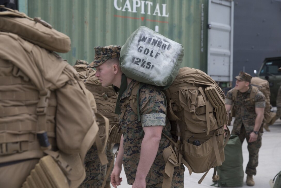 U.S. Marines disembark the USS Bonhomme Richard (LHD 6) after returning from their Spring Patrol of the Asia-Pacific region, April 6, 2017. As the Marine Corps’ only continuously forward deployed unit, the 31st Marine Expeditionary Unit is prepared to respond to a wide range of military operations, from humanitarian assistance missions to limited combat operations, at a moment’s notice. As a balanced air-ground-logistics team, the 31st MEU is ready to respond throughout the Asia-Pacific region. (U.S. Marine Corps photo by Gunnery Sergeant Ernest V. Hagewood) 