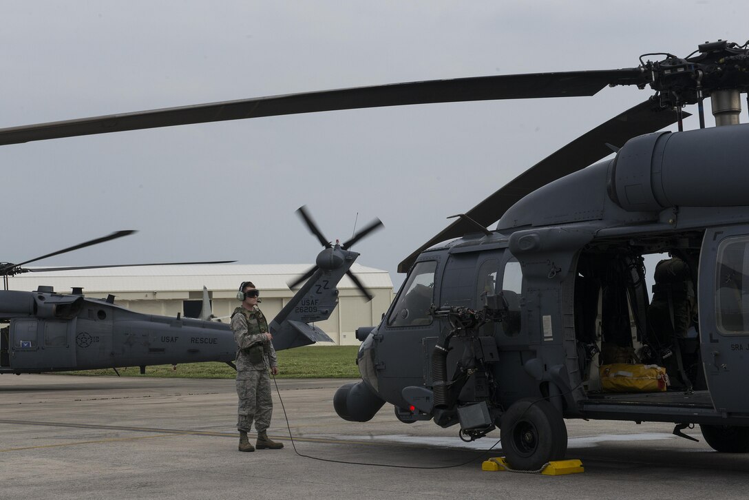 A U.S. Air Force Airman runs through pre-flight procedures of a 33rd Rescue Squadron HH-60 Pave Hawk during a training exercise April 12, 2017, at Kadena Air Base, Japan. Maintaining operational readiness is essential for the 18th Wing to be able to respond to any natural disaster or adversarial threat in the region. (U.S. Air Force photo by Senior Airman John Linzmeier)