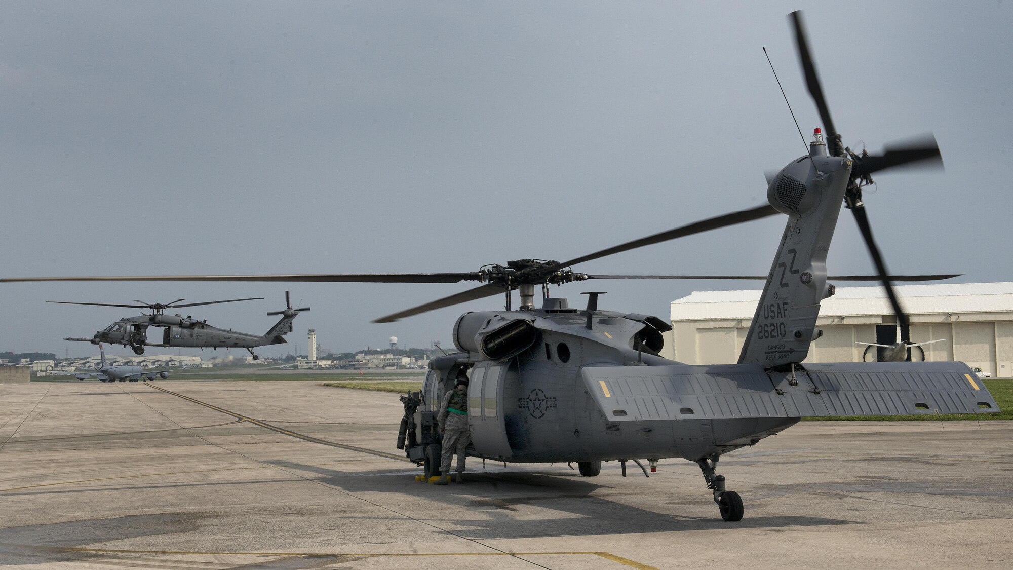 33rd Rescue Squadron HH-60 Pave Hawks take off during a training exercise April 12, 2017, at Kadena Air Base, Japan. Kadena’s size and location makes it ideal as a staging platform for disaster relief and other security operations throughout the Indo-Asia Pacific Theater. (U.S. Air Force photo by Senior Airman John Linzmeier)