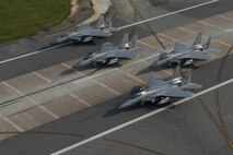 F-15 Eagles from the 67th Fighter Squadron perform an elephant walk during a no-notice readiness exercise April 12, 2017, at Kaden Air Base, Japan. Exercises like this keep members of Team Kadena ready for any situation and to demonstrate their capability to rapidly generate the Wing's full combat capability in the event of an attack on Okinawa or on allies throughout the Indo-Asia Pacific Theater. (U.S. Air Force photo by Senior Airman John Linzmeier)
