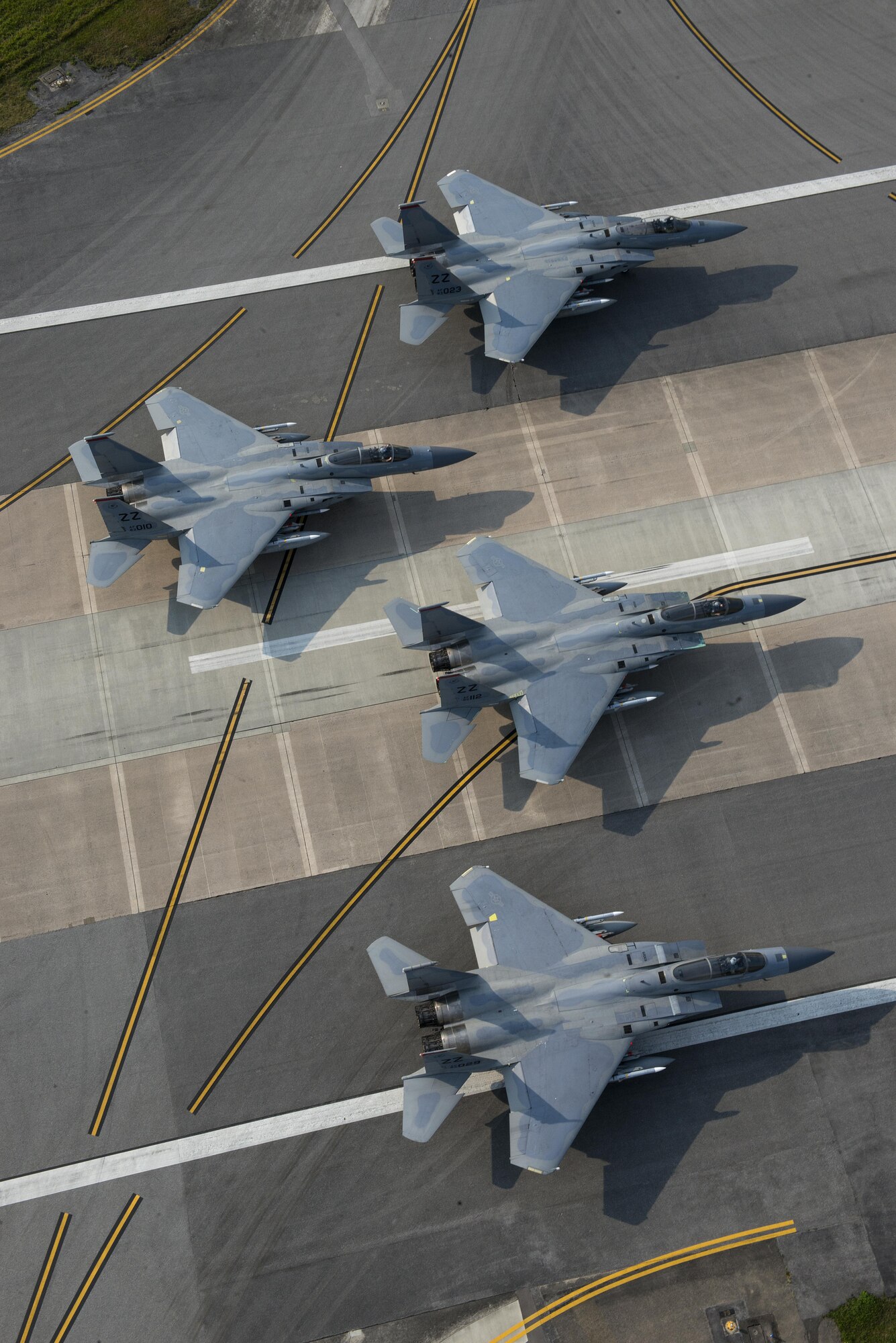 F-15 Eagles from the 67th Fighter Squadron perform an elephant walk during a no-notice readiness exercise April 12, 2017, at Kadena Air Base, Japan. The exercise demonstrated Team Kadena's ability to rapidly respond to and generate air combat power against a simulated attack on Okinawa. Operating from the largest U.S. installation in the Asia-Pacific region, the 18th Wing defends U.S. and Japanese mutual interests by providing a forward power projection platform with fully integrated, deployable, combat power. (U.S. Air Force photo by Senior Airman John Linzmeier)