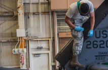 A U.S. Air Force Airman with the 33rd Aircraft Maintenance Unit preforms routine maintenance on an HH-60 Pave Hawk in the 33rd Rescue Squadron maintenance hangar April 11, 2017, at Kadena Air Base, Japan. Maintaining more than 80 combat capable aircraft to sustain air superiority through manifestations such as aerial refueling, airborne warning and control and combat search and rescue, Kadena Air Base contributes to the support of U.S. and Japanese interests. (U.S. Air Force photo by Senior Airman John Linzmeier)