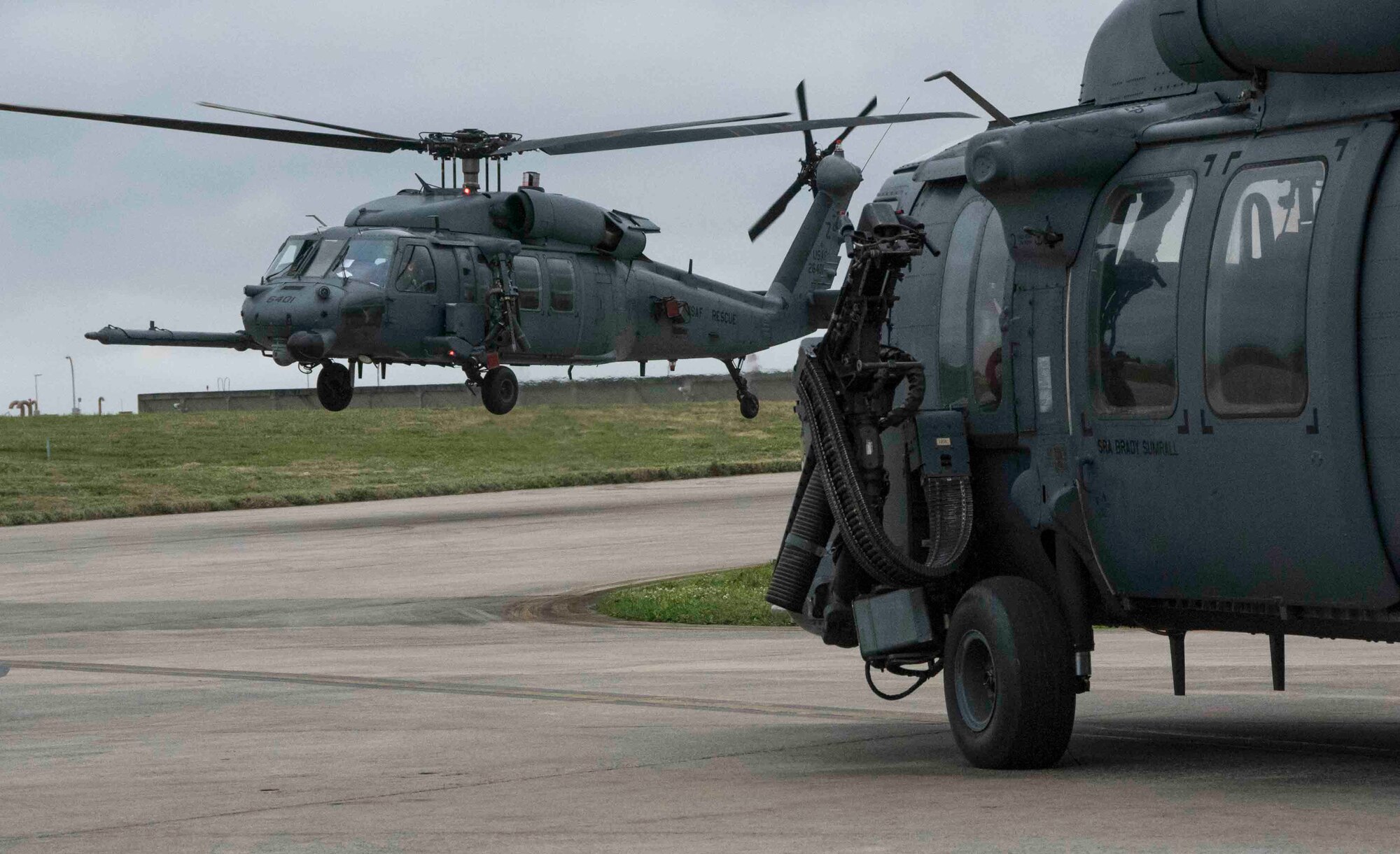 An 33rd Rescue Squadron HH-60 Pave Hawk lands on the flightline during a wing-wide training exercise April 11, 2017, at Kadena Air Base, Japan. The 33rd RQS specializes in water survival, search and rescue, close air support and maritime defense, interdiction and humanitarian aid. (U.S. Air Force photo by Senior Airman John Linzmeier)