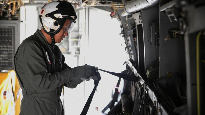 Sgt. 1st Class Midsru Miyazaki conducts pre-flight checks on the MV-22 Osprey before a flight aboard Marine Corps Air Station New River, N.C., April 7, 2017. Before every flight, it is the crew chief’s responsibility to check all safety and mechanical systems to ensure the safety of all the members on the flight. Miyazaki has been training to become the first Japanese MV-22 Osprey crew chief. VMMT-204 is assigned to Marine Aircraft Group 26, 2nd Marine Aircraft Wing. 