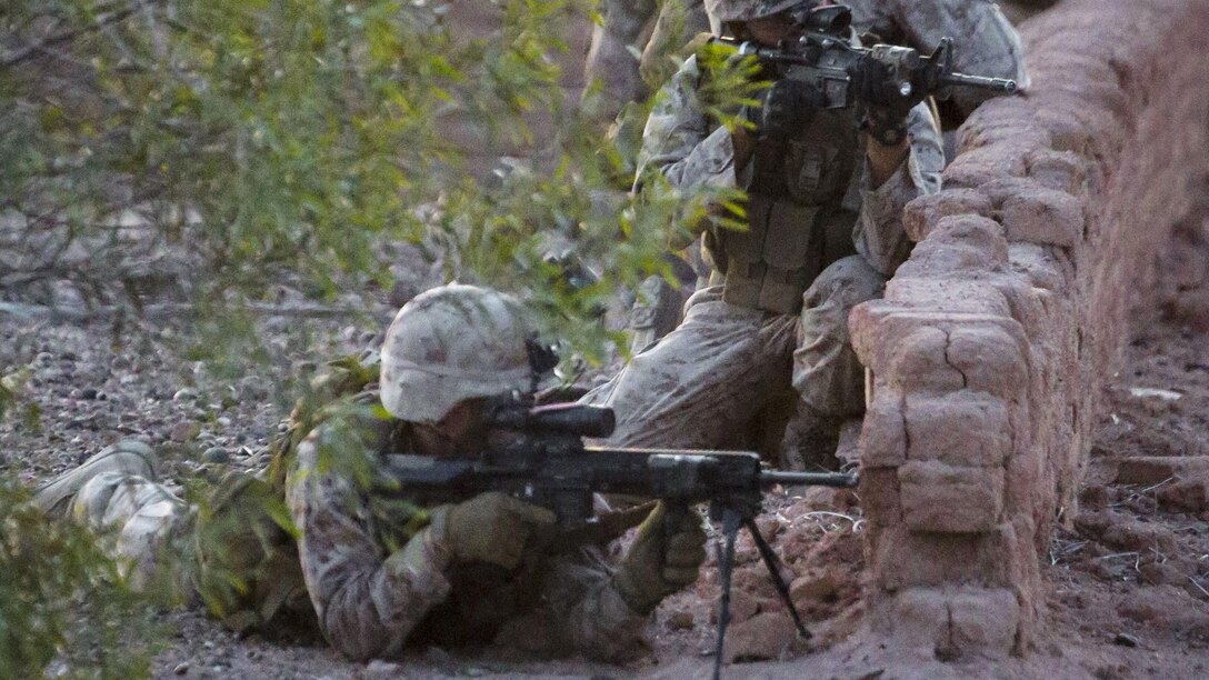 U.S. Marines with 2nd Battalion, 6th Marine Regiment provide security during a heavy huey raid as part of Weapons and Tactics Instructor Course 2-17 at Yuma Proving Grounds, Ariz., April 12, 2017. The exercise was designed to focus on executing a company air assault raid supported by fixed wing and rotary wing escort, and simulated aviation delivered fires. WTI is a seven-week training event hosted by MAWTS-1 cadre, which emphasizes operational integration of the six functions of Marine Corps aviation in support of a Marine Air Ground Task Force and provides standardized advanced tactical training and certification of unit instructor qualifications to support Marine Aviation Training and Readiness and assists in developing and employing aviation weapons and tactics.