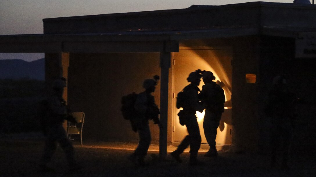 U.S. Marines with 2nd Battalion, 6th Marine Regiment conduct room clearing drills during a heavy huey raid as part of Weapons and Tactics Instructor Course 2-17 at Yuma Proving Grounds, Ariz., April 12, 2017. The exercise was designed to focus on executing a company air assault raid supported by fixed wing and rotary wing escort, and simulated aviation delivered fires. WTI is a seven-week training event hosted by MAWTS-1 cadre, which emphasizes operational integration of the six functions of Marine Corps aviation in support of a Marine Air Ground Task Force and provides standardized advanced tactical training and certification of unit instructor qualifications to support Marine Aviation Training and Readiness and assists in developing and employing aviation weapons and tactics.