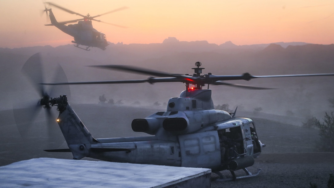 U.S. Marine Corps UH-1Y Venoms assigned to Marine Aviation Weapons and Tactics Squadron One prepare to insert U.S. Marines with 2nd Battalion, 6th Marine Regiment during a heavy huey raid as part of Weapons and Tactics Instructor Course 2-17 at Yuma Proving Grounds, Ariz., April 12, 2017. The exercise was designed to focus on executing a company air assault raid supported by fixed wing and rotary wing escort, and simulated aviation delivered fires. WTI is a seven-week training event hosted by MAWTS-1 cadre, which emphasizes operational integration of the six functions of Marine Corps aviation in support of a Marine Air Ground Task Force and provides standardized advanced tactical training and certification of unit instructor qualifications to support Marine Aviation Training and Readiness and assists in developing and employing aviation weapons and tactics.