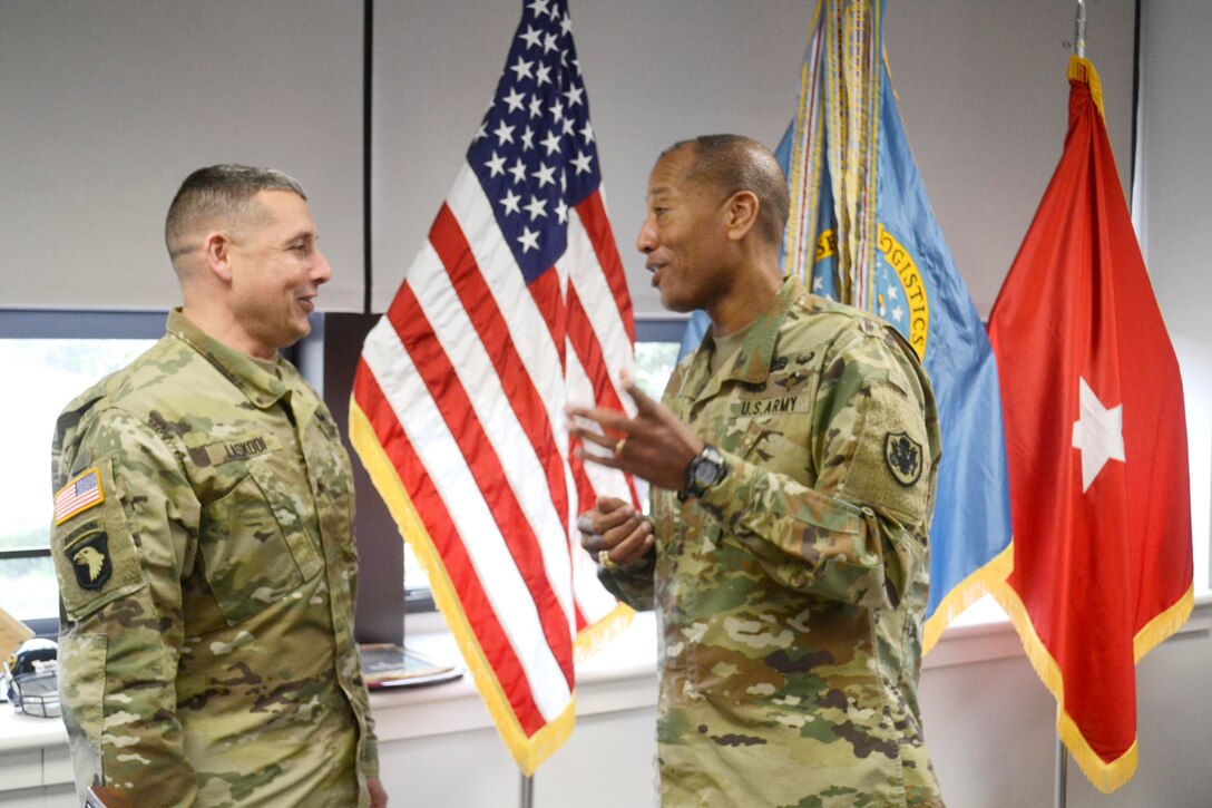 DLA Troop Support Commander Army Brig. Gen. Charles Hamilton, right, and DLA Distribution Commander Army Brig. Gen. John Laskodi, left, meet during Laskodi’s visit to DLA Troop Support April 7, 2017 in Philadelphia. During a round table discussion, Laskodi, DLA Distribution representatives and DLA Troop Support senior leaders discussed collaboration and mutual goals of the two DLA primary field level activities.