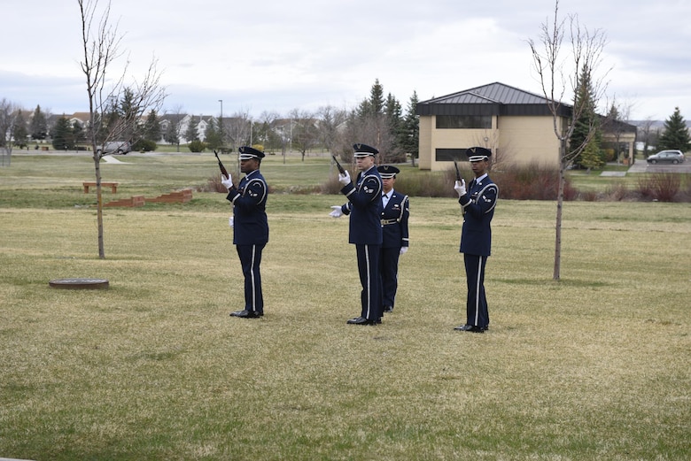 Malmstrom Honor Guard members render a 21 gun salute during a simulated funeral April 12, 2017, at Malmstrom Air Force Base, Mont. The event was part of “Live or Die,” a production helping members think about consequences before they get behind the wheel intoxicated. (U.S. Air Force photo\ Staff Sgt. Lindsey Soulsby)