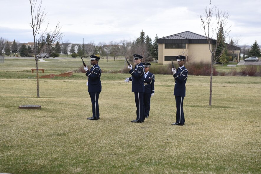 Malmstrom Honor Guard members render a 21 gun salute during a simulated funeral April 12, 2017, at Malmstrom Air Force Base, Mont. The event was part of “Live or Die,” a production helping members think about consequences before they get behind the wheel intoxicated. (U.S. Air Force photo\ Staff Sgt. Lindsey Soulsby)