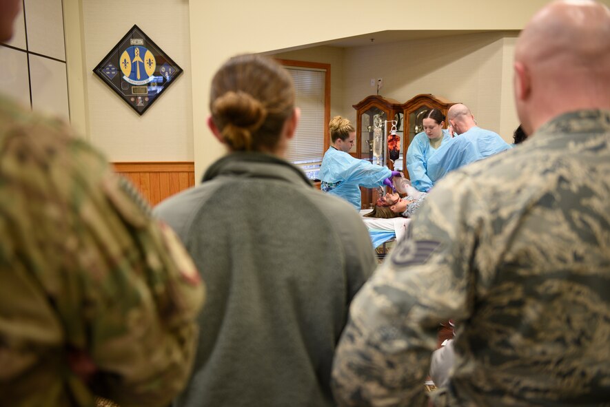 Tech. Sgt. Lauren Pelkey, emergency room nurse, uses a handheld resuscitator while Airman 1st Class Yolanda Alverez Hernandez, ER nurse, performs chest compressions on a drunken driving victim in a simulated operating room April 12, 2017, at the Grizzly Bend at Malmstrom Air Force Base, Mont. The event was part of “Live or Die,” a production helping members think about consequences before they get behind the wheel intoxicated. (U.S. Air Force photo\ Staff Sgt. Lindsey Soulsby)