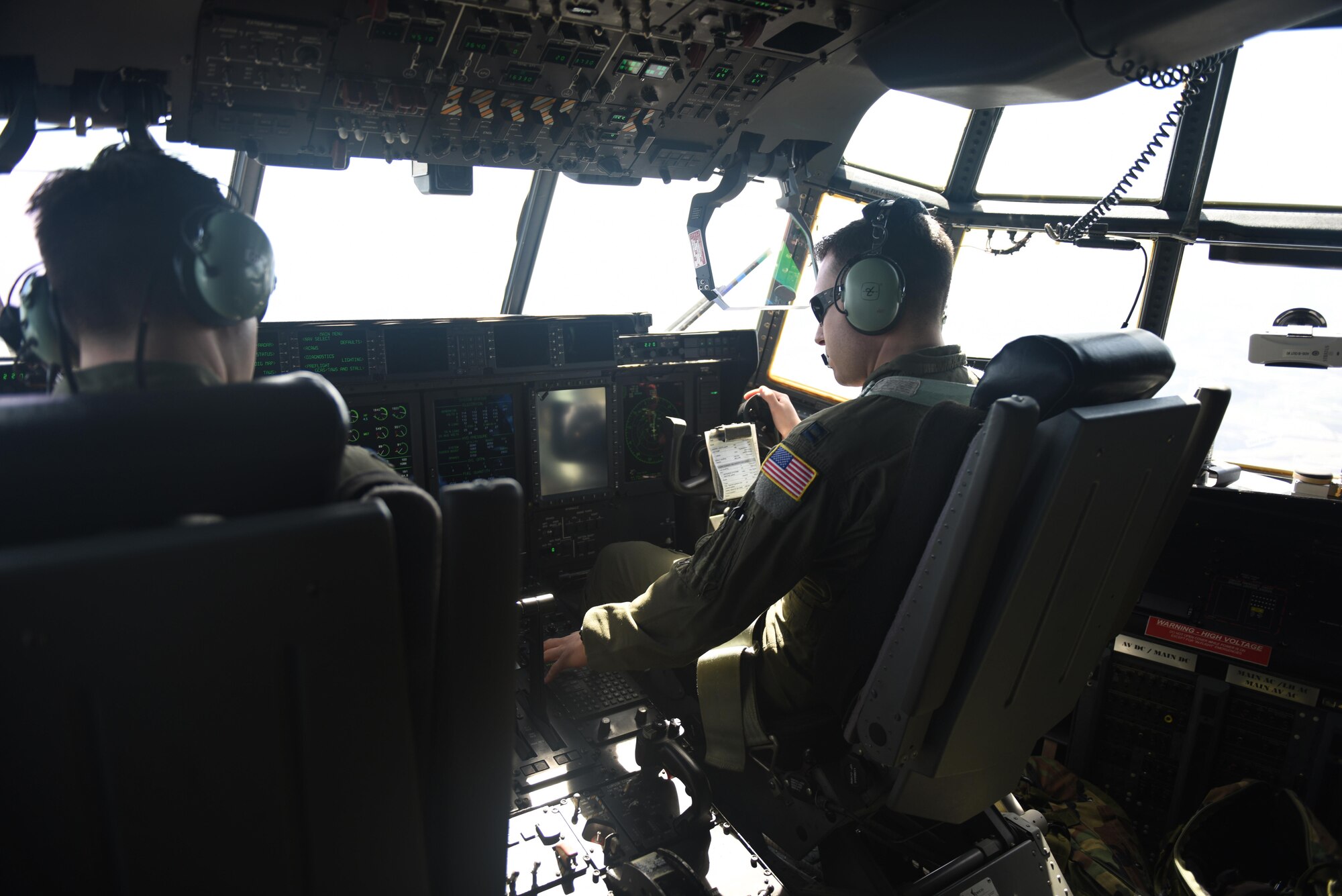 Captain Peter Shoemaker and Capt. Andrew Wentz, pilots with the 193rd Special Operations Wing, Middletown, Pennsylvania, fly an EC-130J aircraft to accomplish required training during the incentive flight conducted April 9, 2017. The incentive flights are a way to highlight outstanding Airmens’ accomplishments as well as provide mission required training for the aircrew. (U.S. Air National Guard photo by Senior Airman Julia Sorber/Released)