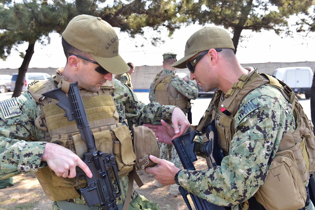 Coast Guard port security personnel prepare weapons and body armor for a training exercise during Operation Pacific Reach Exercise 2017 in Pohang, South Korea, April 3, 2017. The exercise is a bilateral training event designed to ensure readiness and sustain the capabilities that strengthen the U.S.-South Korea alliance. Coast Guardsmen were slated to serve as part of a combined task group conducting port, waterway and coastal security operations to protect assets and personnel. Coast Guard photo by Petty Officer 1st Class Rob Simpson