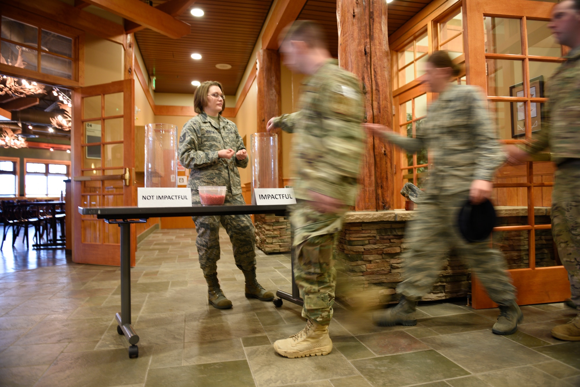 Airmen place beads into a jar stating whether the “Live or Die” production was or was not impactful April 12, 2017, at the Grizzly Bend at Malmstrom Air Force Base, Mont. The event was a production helping members think about consequences before they get behind the wheel intoxicated. (U.S. Air Force photo\ Staff Sgt. Lindsey Soulsby)