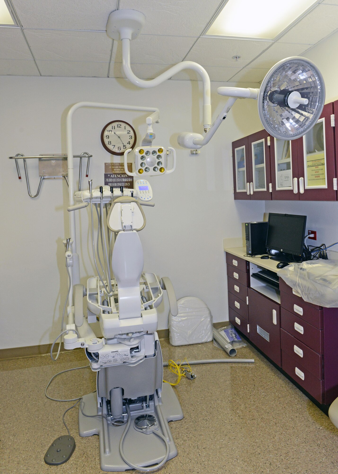 One of 15 new A-dec 500 dental chairs sits in a dental room after being fully unpacked. Clinic officials say the new chairs will provide better comfort and function for patient and dental staff. (U.S. Air Force photo by Kenji Thuloweit)