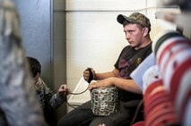 A volunteer simulates a hostage situation during training at Holloman Air Force Base N.M. Apr. 7, 2017. The 49th Civil Engineer Squadron explosive ordnance disposal flight hosted an advanced electronics diagnostic course with EOD Airmen from Misawa Air Force Base, Japan and Cannon Air Force Base, N.M. This training taught EOD Airmen about today's up and coming electronics technology and how these technologies can be incorporated by bomb makers.  During the course, students learned advanced electronic circuitry and how to analyze and interpret how it functions the IED in order to safely disarm a bomb. (U.S. Air Force photo by Staff Sgt. Stacy Jonsgaard)
