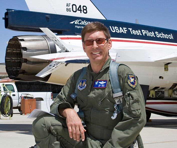 Bill Gray, U.S. Air Force Test Pilot School chief test pilot, poses in front of the F-16 Variable In-flight Stability Test Aircraft, or VISTA. (U.S. Air Force photo by Bobbi Zapka)