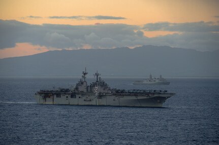 151206-N-BD107-285 PACIFIC OCEAN (Dec. 6, 2015) The Wasp-class amphibious assault ship USS Essex (LHD 2) and the San Antonio-class amphibious transport dock ship USS Anchorage (LPD 23) steam alongside off the coast of Hawaii. Essex is the flagship of the Essex Amphibious Ready Group and, with the embarked 15th Marine Expeditionary Unit (15th MEU), is currently operating in the U.S. 3rd Fleet area of operations. (U.S. Navy photo by Mass Communication Specialist 2nd Class Liam Kennedy/Released)