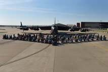 All of the motorcyclists participating in Thunder on the Bayou line up in front of a B-52 Stratofortress at Barksdale Air Force Base, La., April 7, 2017. Thunder on the Bayou is an annual safety brief and ride for motorcyclists in the spring. (U.S. Air Force photo/Airman 1st Class Stuart Bright)