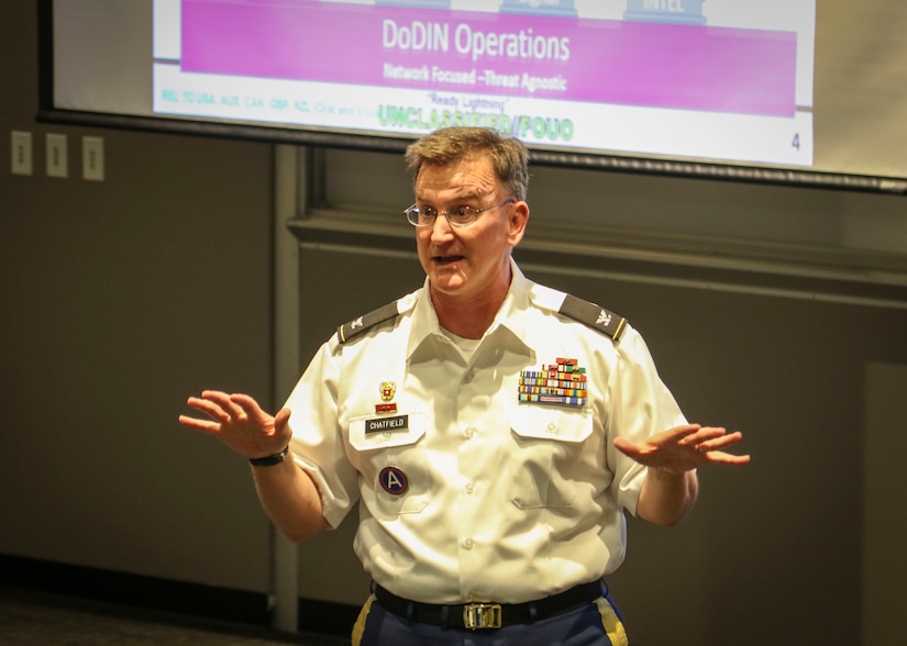 Col. James “Jim” M. Chatfield, cyber director and deputy G-3 of operations for the 335th Signal Command (Theater) speaks to approximately 50 graduate students and Army Reserve Officer Training Corps cadets at the Scheller College of Business at the Georgia Institute of Technology in downtown Atlanta, Georgia, April 11.  Chatfield spent about 90 minutes discussing Army cyber capabilities and the future of cyber operations.  (Official U.S. Army Reserve Photo by Sgt. 1st Class Brent C. Powell)