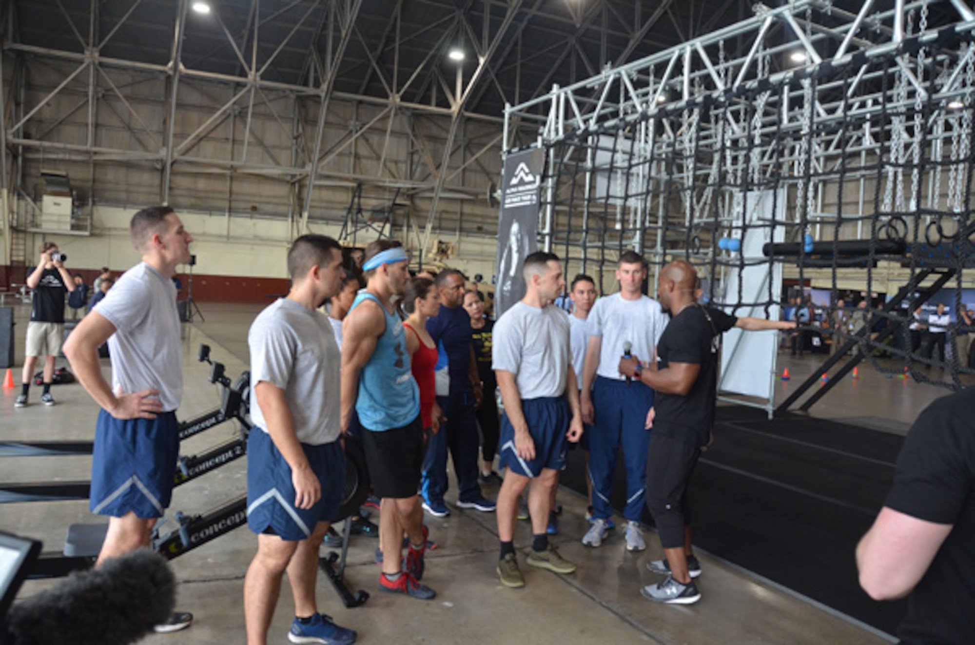 Alpha Warrior strength and conditioning coach Bennie Wylie Jr. gives instructions on how to use the Alpha Warrior Battle Rig during a presentation at Joint Base San Antonio-Lackland April 11. (U.S. Air Force photo/Steve Warns)