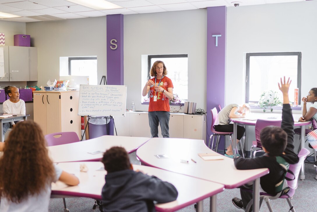 Christine Gramlich, Science, Technology, Engineer and Math Center of Innovation coordinator, teaches students about chemical and physical reactions at Joint Base Andrews, Md., April 5, 2017. The center provides a learning environment to help military children make the most of opportunities in higher education, careers or military service. (U.S. Air Force photo by Senior Airman Delano Scott)