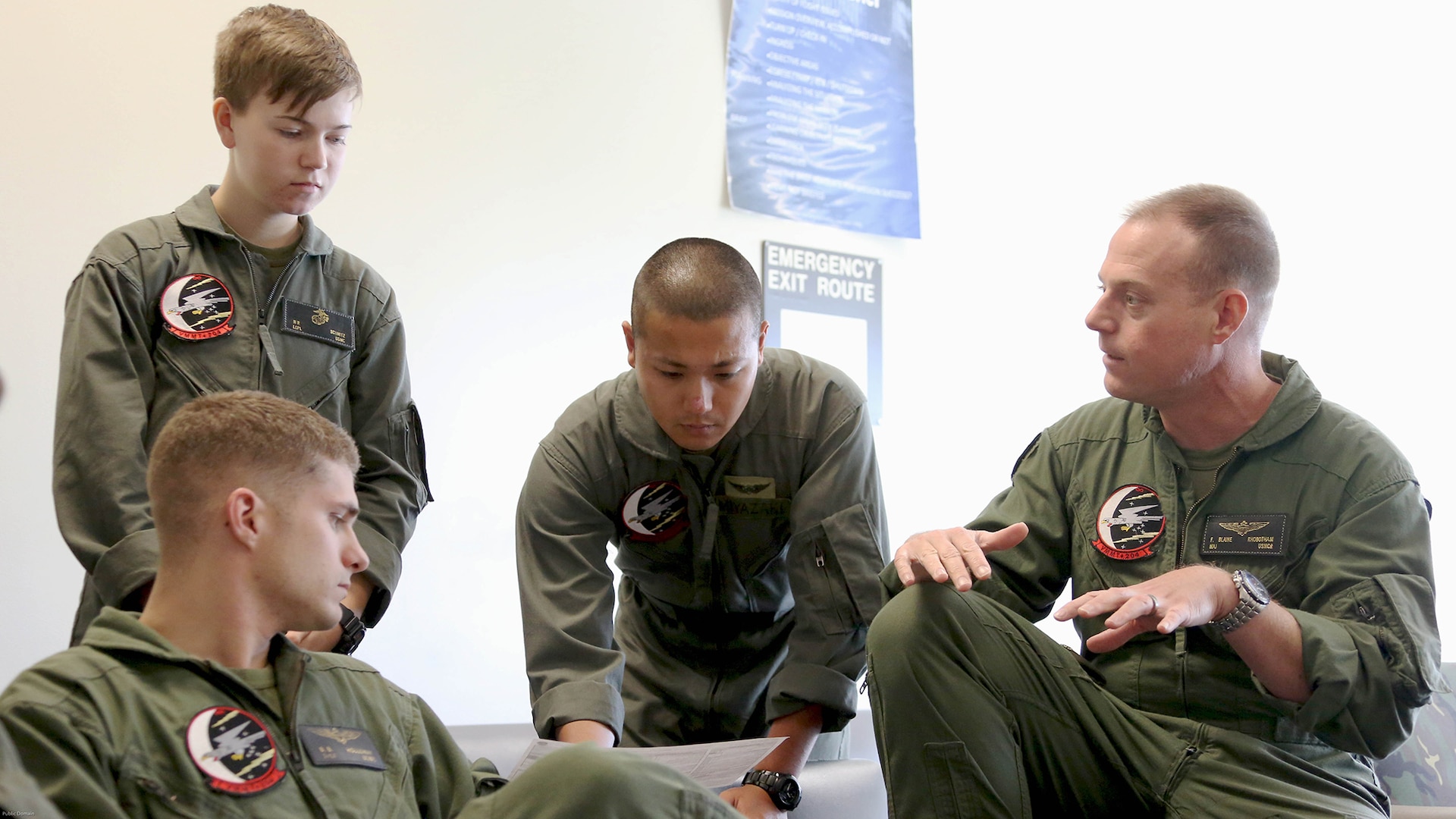 Sgt. 1st Class Midsru Miyazaki, center, coordinates with Marines assigned to Marine Medium Tiltrotor Squadron 204 during a pre-flight brief at Marine Corps Air Station New River, N.C., April 7, 2017. Miyazaki has been training to become the first Japanese MV-22 Osprey crew chief. VMMT-204’s mission is to provide training to Osprey pilots, crew chiefs and units in the use and maintenance of the MV-22 Osprey tiltrotor aircraft. VMMT-204 is assigned to Marine Aircraft Group 26, 2nd Marine Aircraft Wing.
