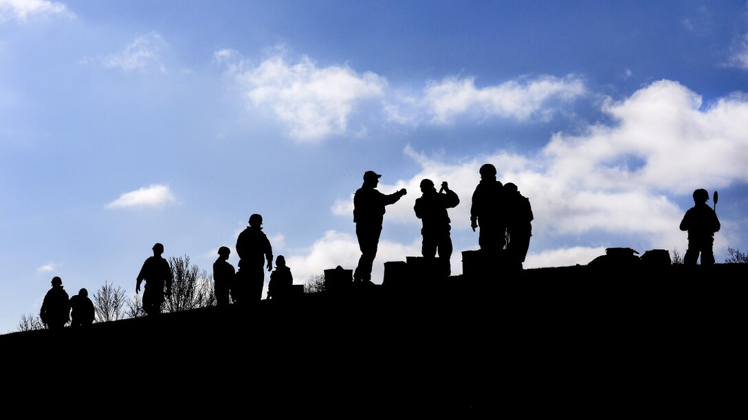 Airmen prepare for weapons training at the Fort Custer Training Center in Battle Creek, Mich., April 12, 2017. The airmen are security forces specialists assigned to the Ohio Air National Guard's 180th Fighter Wing. Frequent training events allow airmen to prepare for deployments, ensuring they are fit to fight. Air National Guard photo by Staff Sgt. Shane Hughes