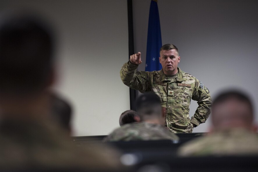 Maj. Michael Warren, 824th Base Defense Squadron commander, gives remarks during a deployment briefing prior to departure, April 12, 2017, at Moody Air Force Base, Ga. More than 100 Airmen from the 824th BDS, known as the ‘Ghostwalkers,’deployed to Southwest Asia to provide fully-integrated, highly capable and responsive forces while safeguarding Expeditionary Air Force assets. (U.S. Air Force photo by Airman 1st Class Greg Nash)