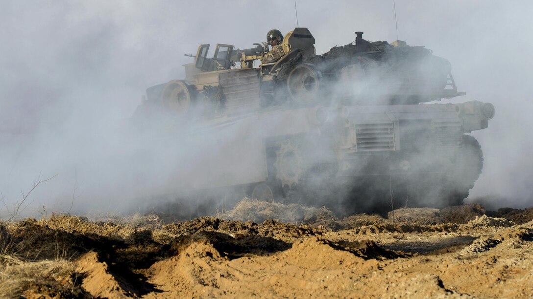 Estonian and U.S. soldiers train during a combat exercise at the Estonian Central Training Area near Tapa, Estonia, April 6, 2017. The U.S. soldiers, assigned to Company C, 1st Battalion, 68th Armor Regiment, participated to boost the capabilities of the Estonian forces under the NATO-led Operation Atlantic Resolve. Army photo by Jason Johnston