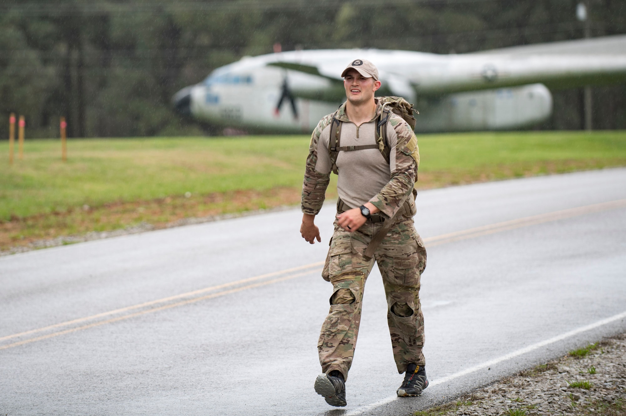 U.S. Air Force Staff Sgt. Kenneth Bartle, 19th Air Support Operations Squadron Tactical Air Control Party specialist finishes a rucksack march during a German armed forces proficiency assessment, April 6, 2017, at Fort Campbell, Ky. To enhance their ability to work together in deployed locations, members of the German Air Force travelled to Fort Campbell to train and exercise with the 19th ASOS. While at Fort Campbell, The German Air Force members hosted a German armed forces proficiency assessment for Airmen consisting of shooting firearms, swimming, agility exercises and a rucksack march.