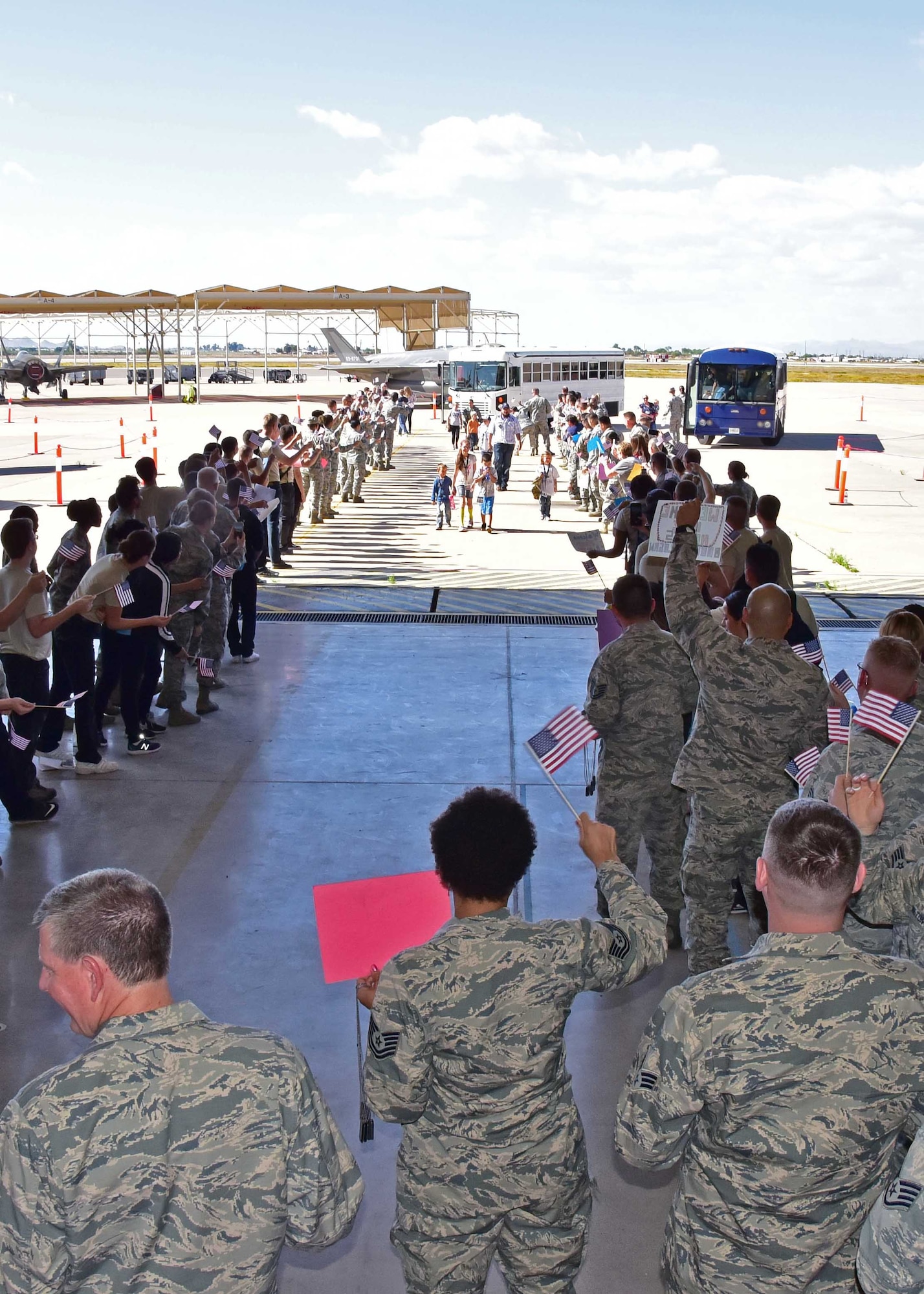 944th Fighter Wing Airmen welcome home the kids Apr. 1 during Operation Reserve Kids at Luke Air Force Base, Ariz. (U.S. Air Force photo by Tech. Sgt. Louis Vega Jr.)