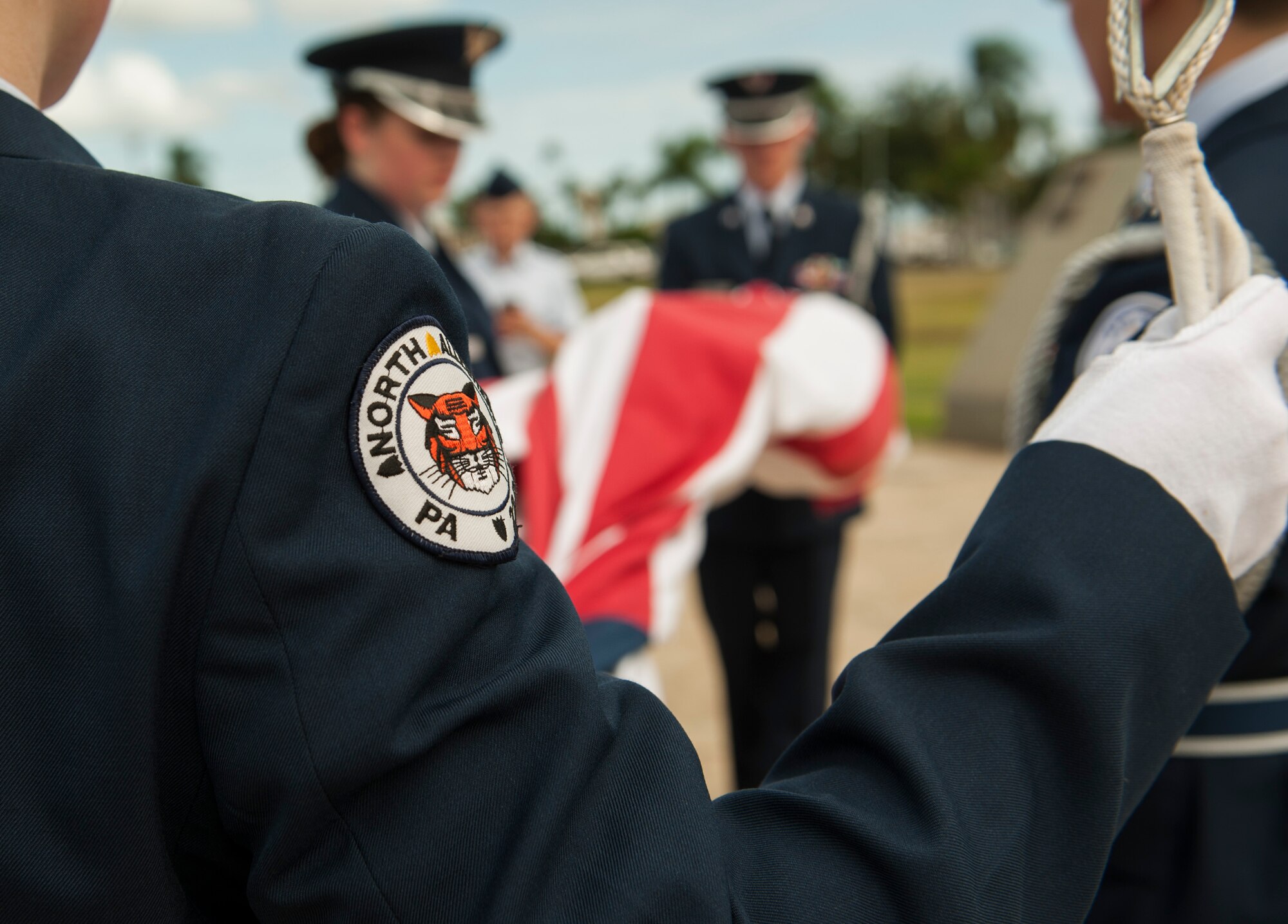 Students from the North Allegheny Senior High School Junior Reserve Officers’ Training Corps (JROTC) in Wexford, PA, performed a Retreat Ceremony at Hickam Air Force Base, Hawaii, April 13, 2017.  The JROTC members were given a tour of Joint Base Pearl Harbor-Hickam from the 515th Air Mobility Operations Wing.  (U.S. Air Force photo by Tech. Sgt. Heather Redman)