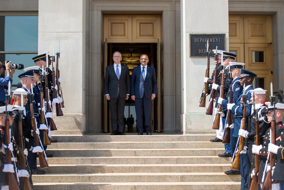 Defense Secretary Jim Mattis stands with Turkish Defense Minister Fikri Isik during a ceremony welcoming Isik to the Pentagon, April 13, 2017. DoD photo by Air Force Staff Sgt. Jette Carr