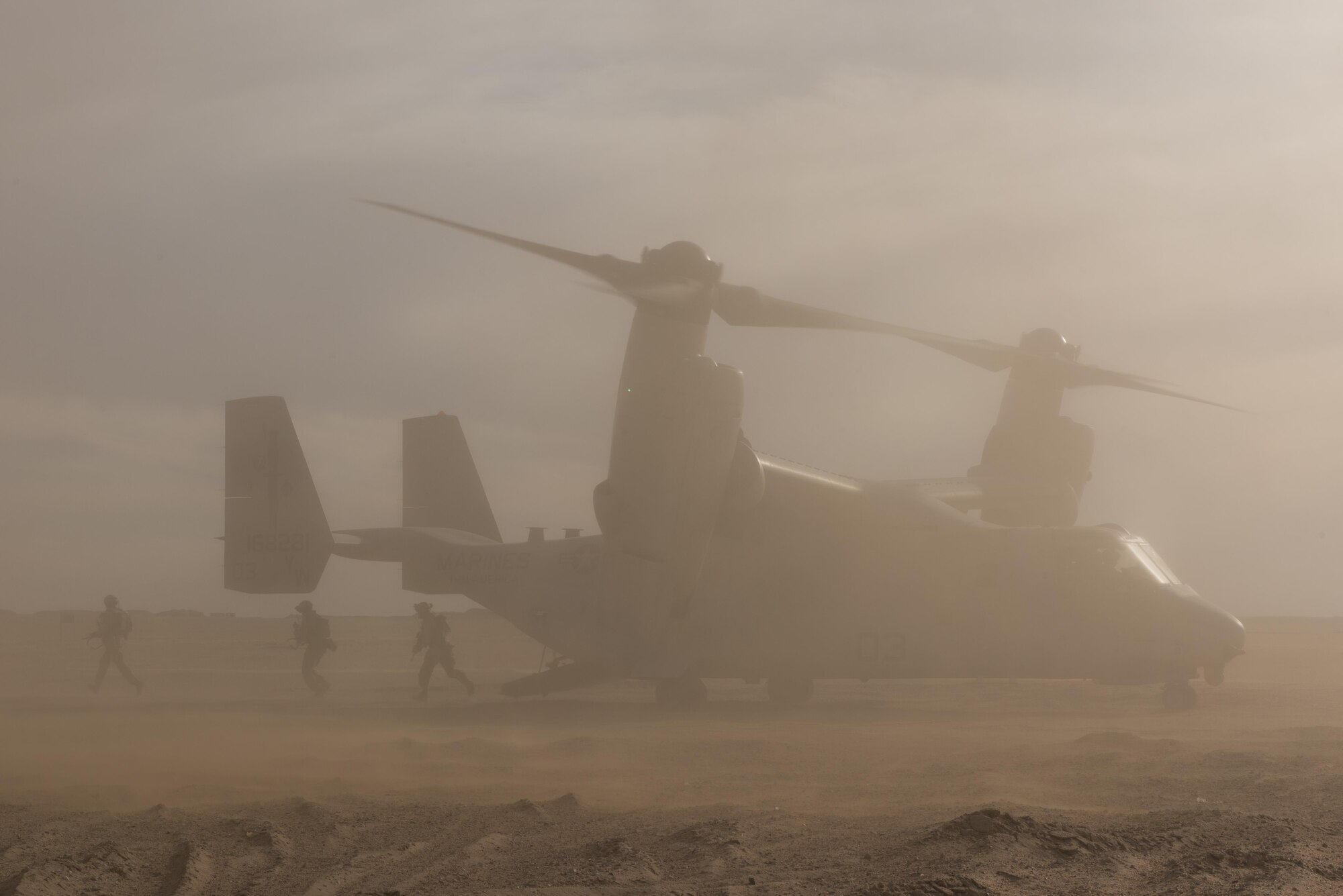 U.S. Marines assigned to 1st Battalion, 7th Marine regiment exit an MV-22 Osprey assigned to Marine Medium Tiltrotor Squadron 165 during a mission exercising the tactical recovery of aircraft and personnel at an undisclosed location in Southwest Asia, April 5, 2017. The TRAP capability provided by the Marines enables pilots supporting Operation Inherent Resolve to fly with the confidence of knowing rescue personnel are on standby. (U.S. Air Force photo/Master Sgt. Benjamin Wilson)(Released)