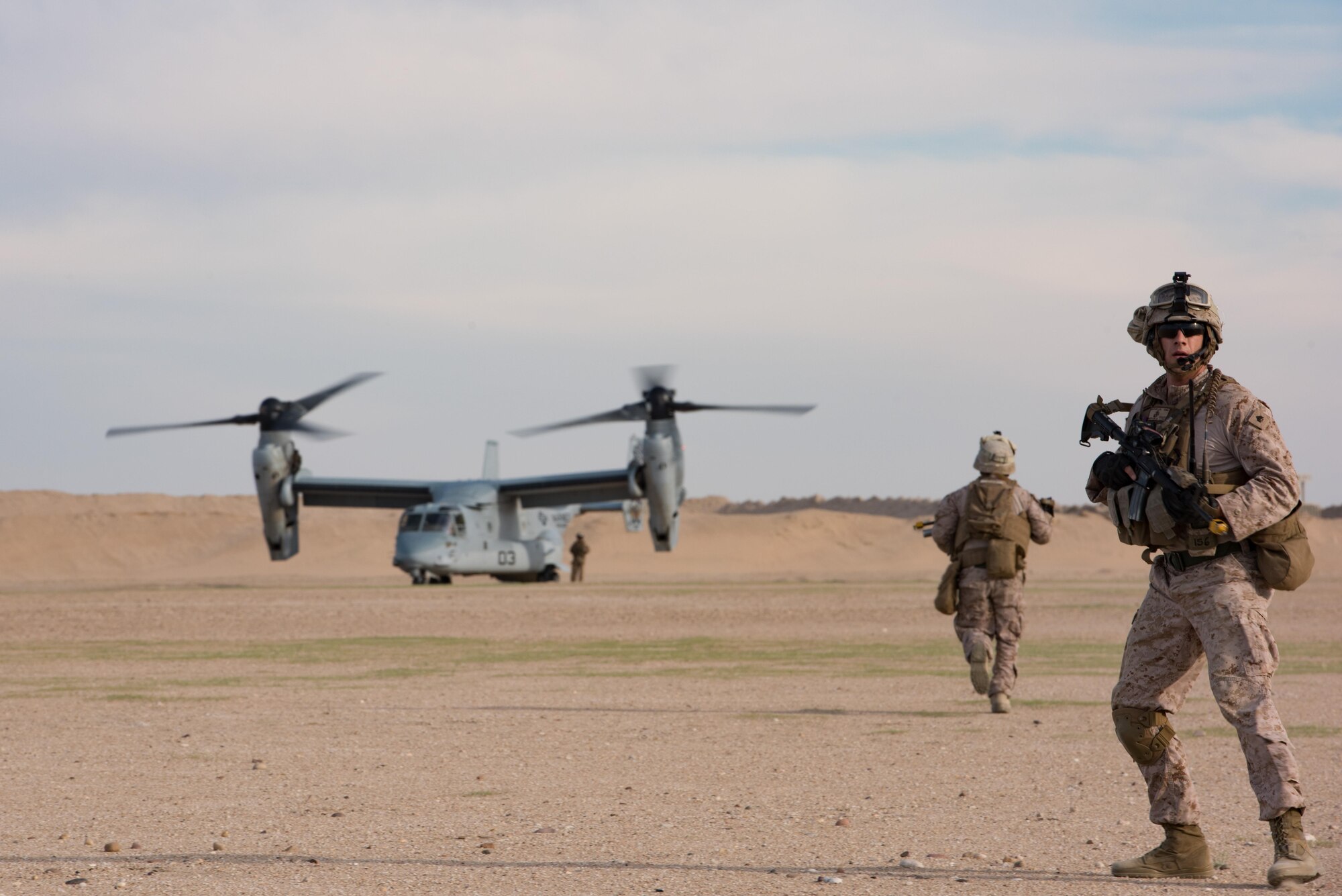 U.S. Marines assigned to the 1st Battalion, 7th Marine Regiment, Special Purpose Marine Air-Ground Task Force-Crisis Response-Central Command return to an MV-22 assigned to Marine Medium Tiltrotor Squadron 165 during a mission exercising the tactical recovery of aircraft and personnel at an undisclosed location in Southwest Asia, April 5, 2017. The TRAP capability provided by the Marines enables pilots supporting Operation Inherent Resolve to fly with the confidence of knowing rescue personnel are on standby. (U.S. Air Force photo/Master Sgt. Benjamin Wilson)(Released)