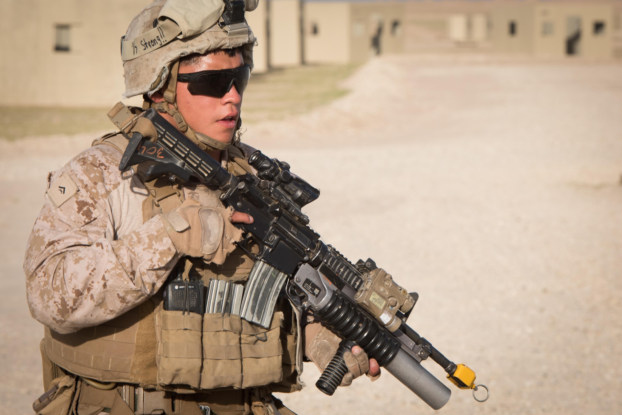 A U.S. Marine assigned to 1st Battalion, 7th Marine Regiment, Special Purpose Marine Air-Ground Task Force-Crisis Response-Central Command posts as security during a tactical recovery of aircraft and personnel exercise at an undisclosed location in Southwest Asia, April 5, 2017.  Marines with 1/7 compose the ground combat element, to include the dedicated TRAP force, for SPMAGTF-CR-CC within the USCENTCOM area of operations, spanning 20 countries. SPMAGTF-CR-CC is currently forward deployed to several host nations, with the ability to respond to a variety of contingencies rapidly and effectively. (U.S. Air Force photo/Master Sgt. Benjamin Wilson)(Released)