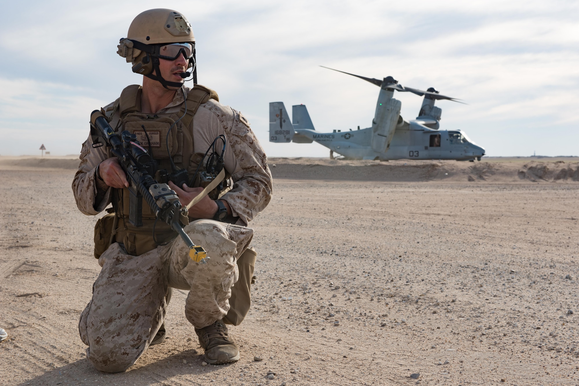 Staff Sgt. Nick Graham, 1st Battalion, 7th Marine Regiment, Special Purpose Marine Air-Ground Task Force-Crisis Response-Central Command, posts security during a mission exercising the tactical recovery of aircraft and personnel at an undisclosed location in Southwest Asia, April 5, 2017. The TRAP capability provided by the Marines enables pilots supporting Operation Inherent Resolve to fly with the confidence of knowing rescue personnel are on standby. (U.S. Air Force photo/Master Sgt. Benjamin Wilson)(Released)