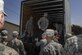 U.S. Air Force Airmen from Osan Air Base, Republic of Korea, receive their belongings following their arrival to Wolf Pack Park, an alternate lodging area at Kunsan Air Base, ROK, April 12, 2017. U.S. Air Force, Army, Marine Corps and Navy personnel and aircraft will train with the Republic of Korea Air Forces in the annual, bilateral training Exercise MAX THUNDER 17, which will be hosted at Kunsan Air Base, Republic of Korea, April 17-28, 2017. (U.S. Air Force Photo by Senior Airman Michael Hunsaker/Released)