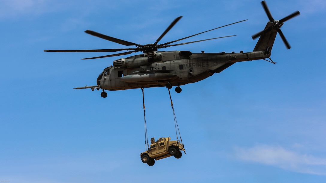 Marines with Marine Aviation Weapons and Tactics Squadron 1 conduct external lifts with a CH-53E Super Stallion during the semiannual Weapons and Tactics Instructor Course 2-17, at Auxiliary Airfield II, Yuma, Arizona, April 7. Lasting seven weeks, WTI is a training evolution hosted by MAWTS-1 which provides standardized advanced and tactical training and certification of unit instructor qualifications to support Marine aviation training and readiness. 