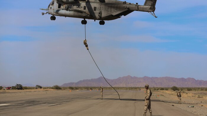 Marines with Echo Company, 2nd Battalion, 6th Marines, conduct fast rope training in support of Marine Aviation Weapons and Tactics Squadron 1 during the semiannual Weapons and Tactics Instructor Course 2-17, at Auxiliary Airfield II, Yuma, Arizona, April 7, 2017. Lasting seven weeks, WTI is a training evolution hosted by MAWTS-1 which provides standardized advanced and tactical training and certification of unit instructor qualifications to support Marine aviation training and readiness. 