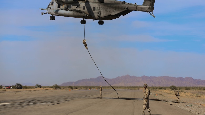 Marines with Echo Company, 2nd Battalion, 6th Marines, conduct fast rope training in support of Marine Aviation Weapons and Tactics Squadron 1 during the semiannual Weapons and Tactics Instructor Course 2-17, at Auxiliary Airfield II, Yuma, Arizona, April 7, 2017. Lasting seven weeks, WTI is a training evolution hosted by MAWTS-1 which provides standardized advanced and tactical training and certification of unit instructor qualifications to support Marine aviation training and readiness. 