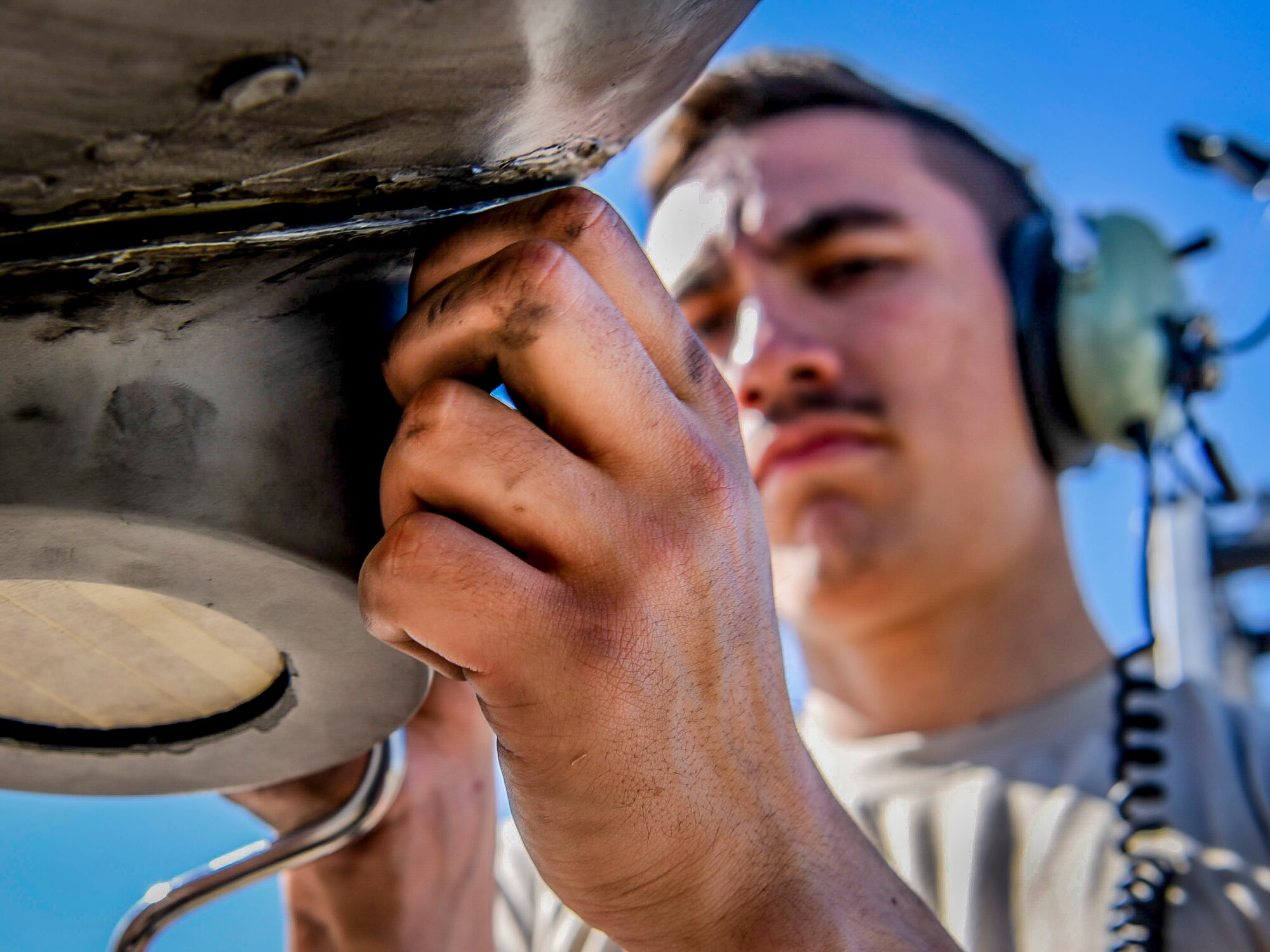 Airman 1st Class Leo McGeehon, 354th Expeditionary Aircraft Maintenance Unit avionics apprentice, maintains an optical sensor on an A-10C Thunderbolt II April 11, 2017, at Incirlik Air Base, Turkey. The optical sensor detects heat-seeking missiles. Marshall is deployed in support of Operation Inherent Resolve. (U.S. Air Force photo by Tech Sgt. Eboni Reams)