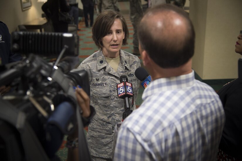 Lt. Col. Lisa Mabbutt, 11th Civil Engineer Squadron commander, speaks to media during a town hall meeting at the Colony South Hotel in Clinton, Md., April 12, 2017. Joint Base Andrews leadership attended the meeting to inform local community members and answer questions about a recent F-16C Fighting Falcon crash. (U.S. Air Force photo by Senior Airman Mariah Haddenham)