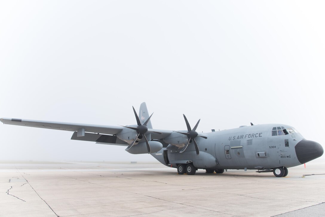 A WC-130J Super Hercules aircraft with the 53rd Weather Reconnaissance Squadron "Hurricane Hunters" is surrounded by fog April 12 at Keesler Air Force Base, Mississippi. (U.S. Air Force photo/Staff Sgt. Heather Heiney)