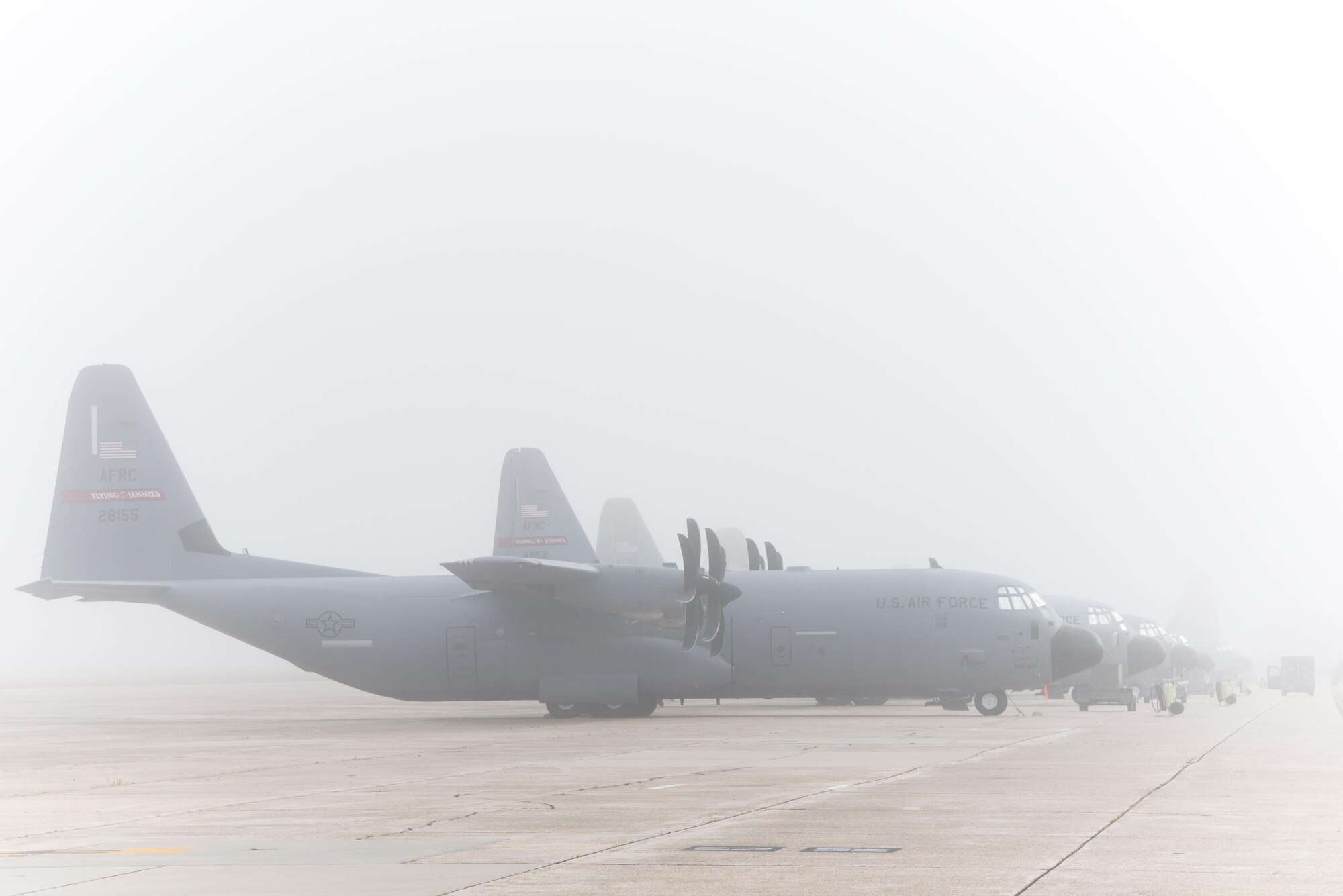 C-130J Super Hercules aircraft with the 815th Airlift Squadron "Flying Jennies" are surrounded by fog April 12 at Keesler Air Force Base, Mississippi. (U.S. Air Force photo/Staff Sgt. Heather Heiney)